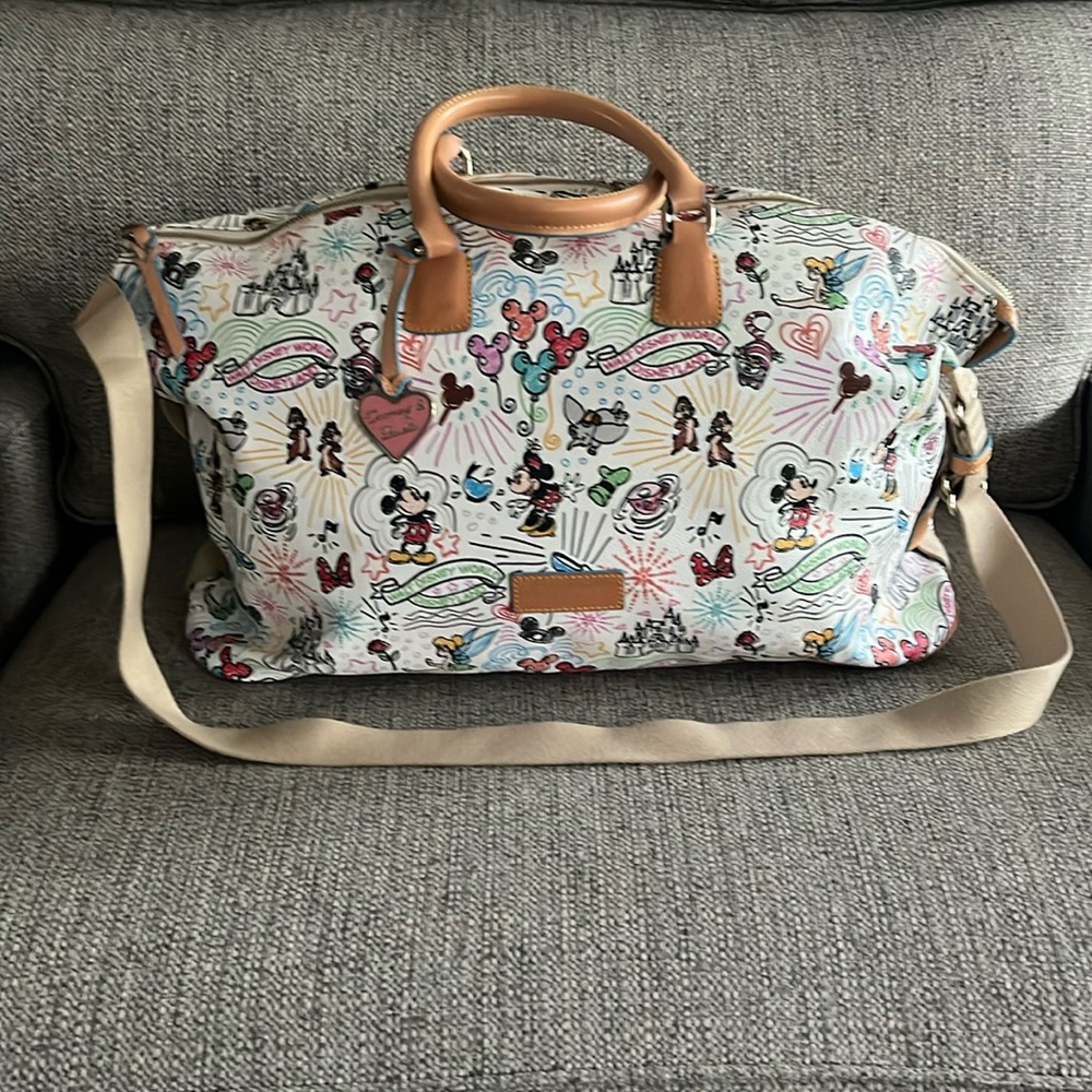 Dooney and Bourke Disney Parks weekender bag Magic Kingdom Walt Disney World